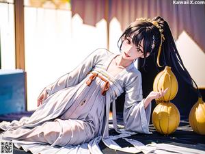 A woman in a white kimono sitting on a rock.